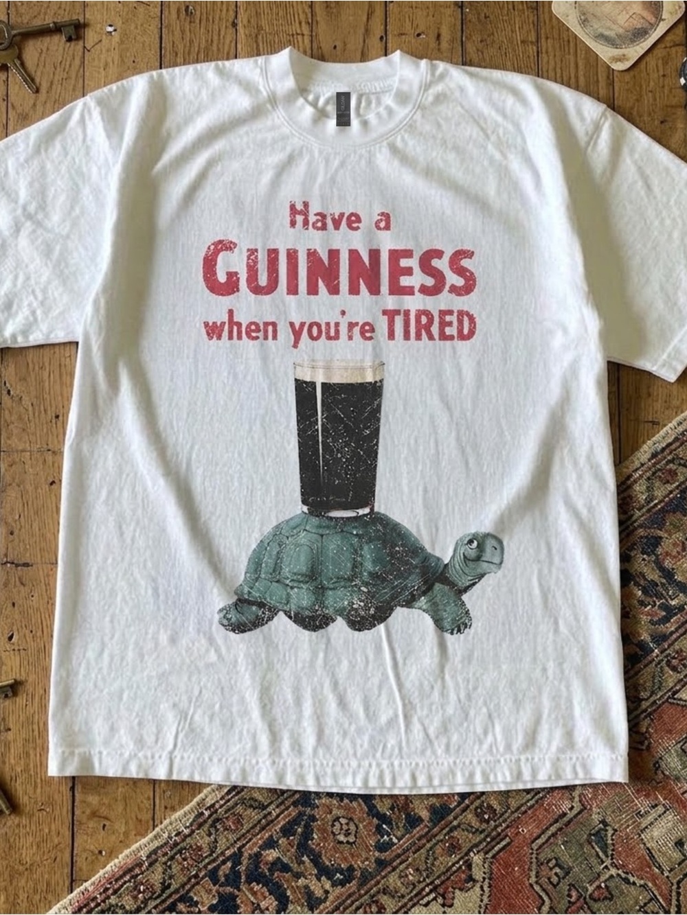 Gildan White Tee with Red Guinness Text and Green Turtle Graphic